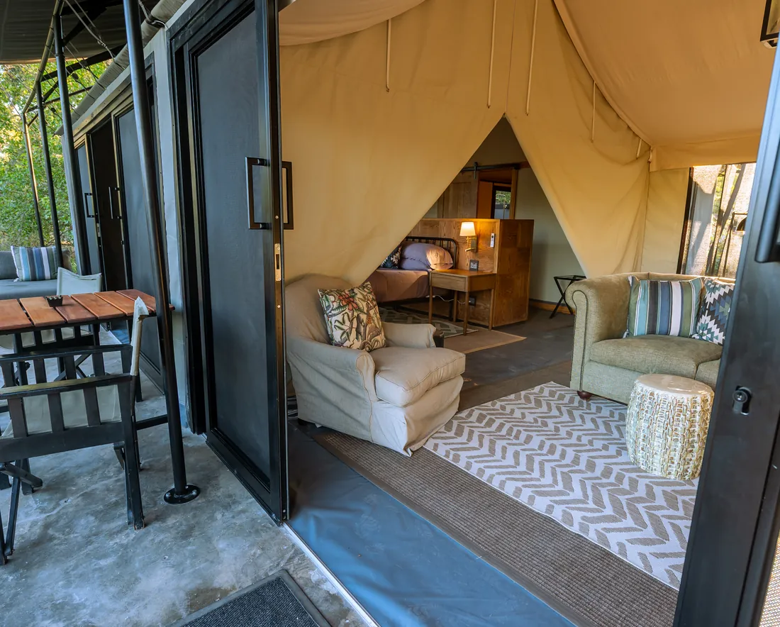 Comfortable safari tent with outdoor seating